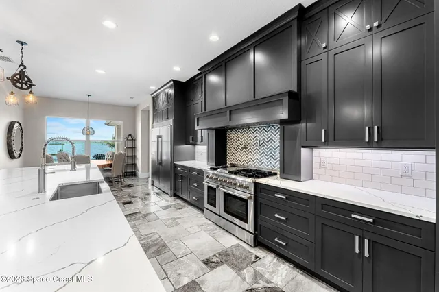 a view of a chairs and table in the patio