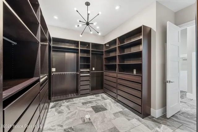 a view of a swimming pool with a yard