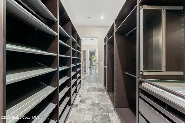 a kitchen with granite countertop a stove and a sink