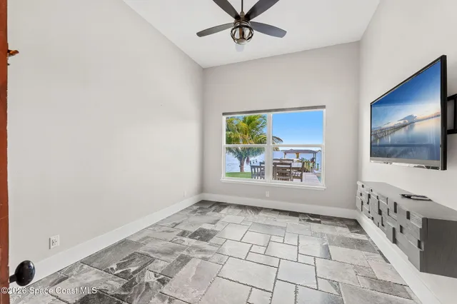 a view of a park with large trees