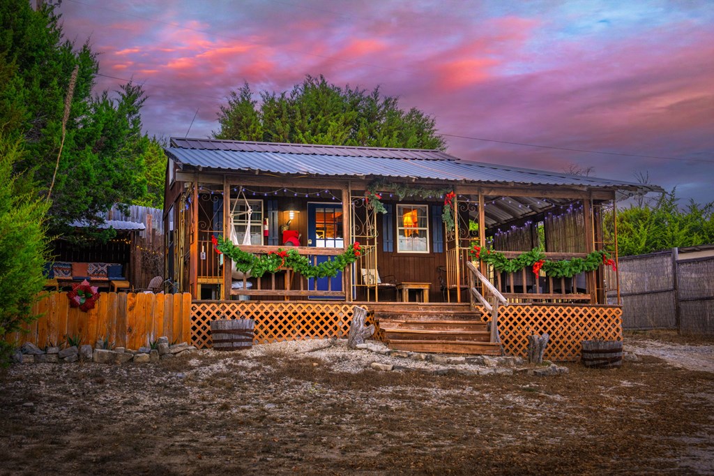 152 Henderson Branch Road West Ingram, TX 78025 - Photo 33 of 47 a view of a patio with a table and chairs