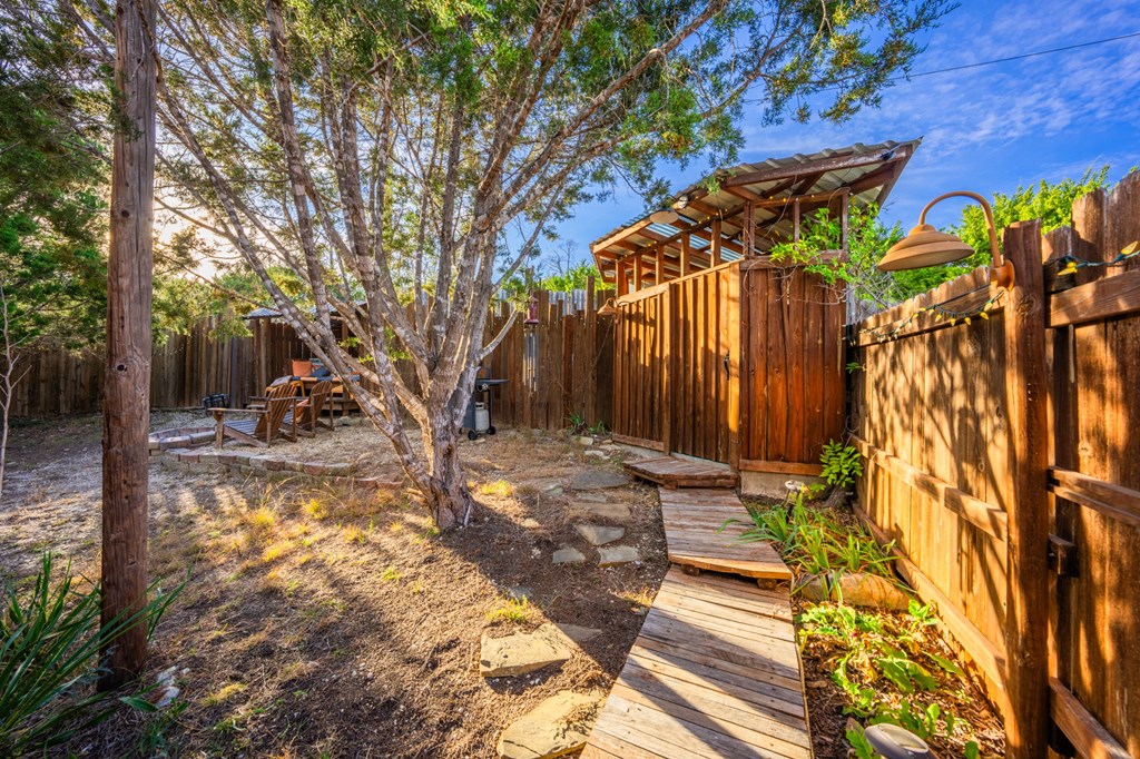 152 Henderson Branch Road West Ingram, TX 78025 - Photo 37 of 47 a view of a backyard with pathway