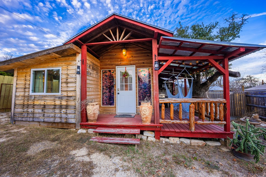 152 Henderson Branch Road West Ingram, TX 78025 - Photo 40 of 47 a view of wooden bench in front of a house