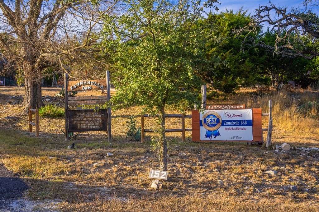 152 Henderson Branch Road West Ingram, TX 78025 - Photo 46 of 47 a view of a street with benches