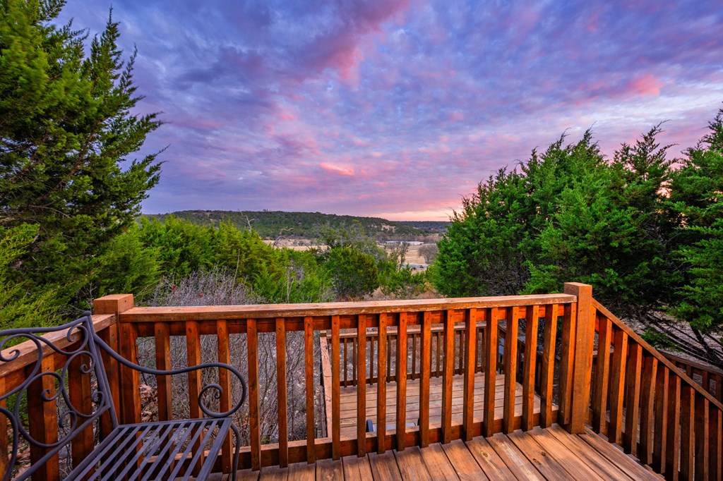 152 Henderson Branch Road West Ingram, TX 78025 - Photo 7 of 47 a balcony with an outdoor space