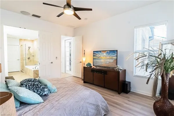 a picture of living room with furniture and wooden floor