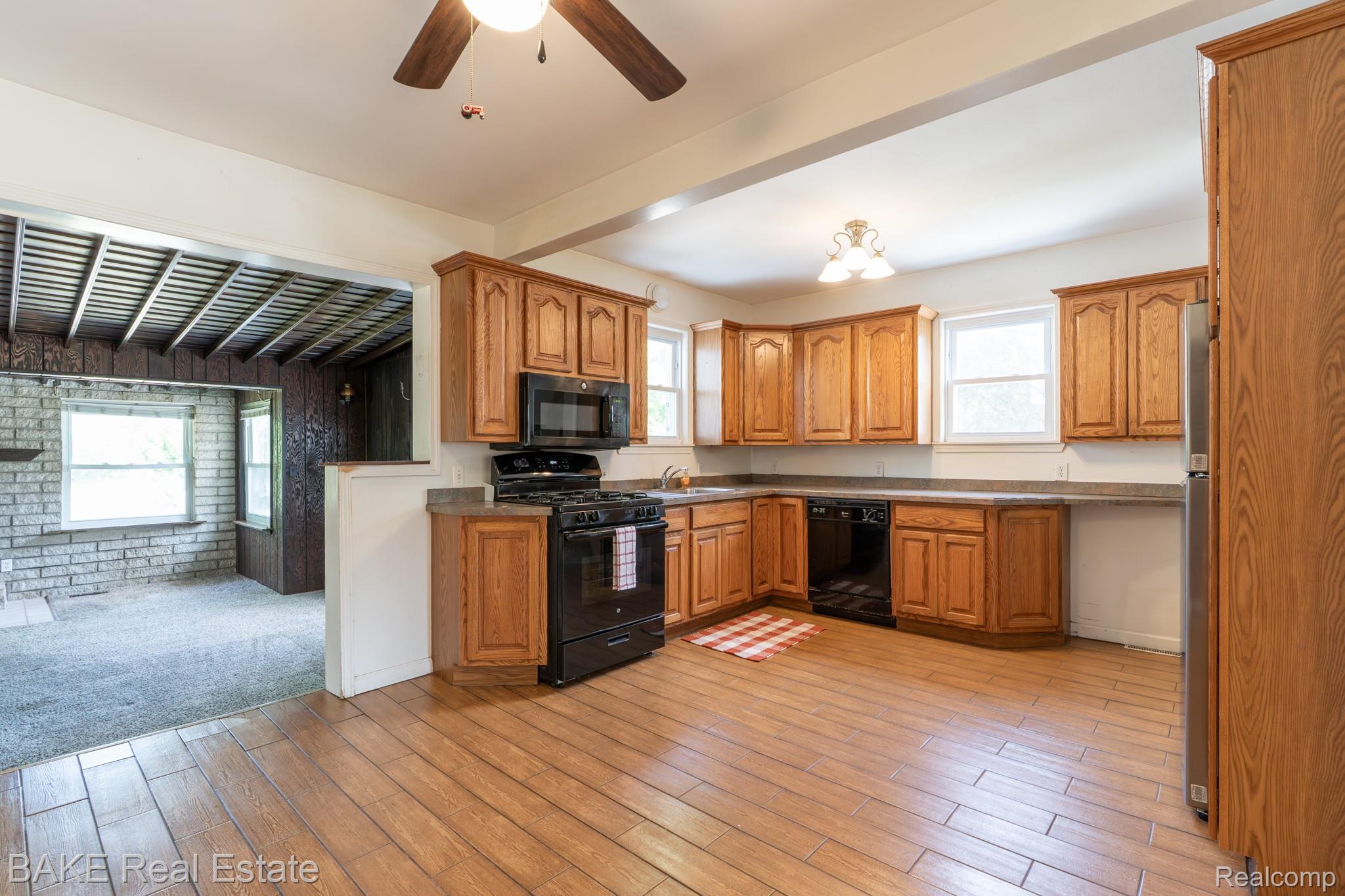 10195 Stark Road Livonia, MI 48150 - Photo 17 of 43 Oak Kitchen with Tile Floor