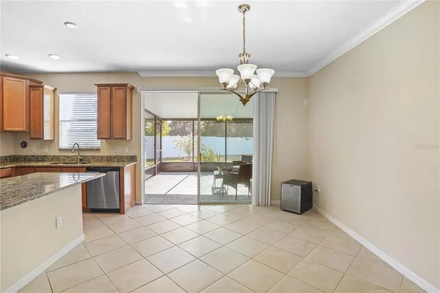a view of a kitchen with a sink and microwave