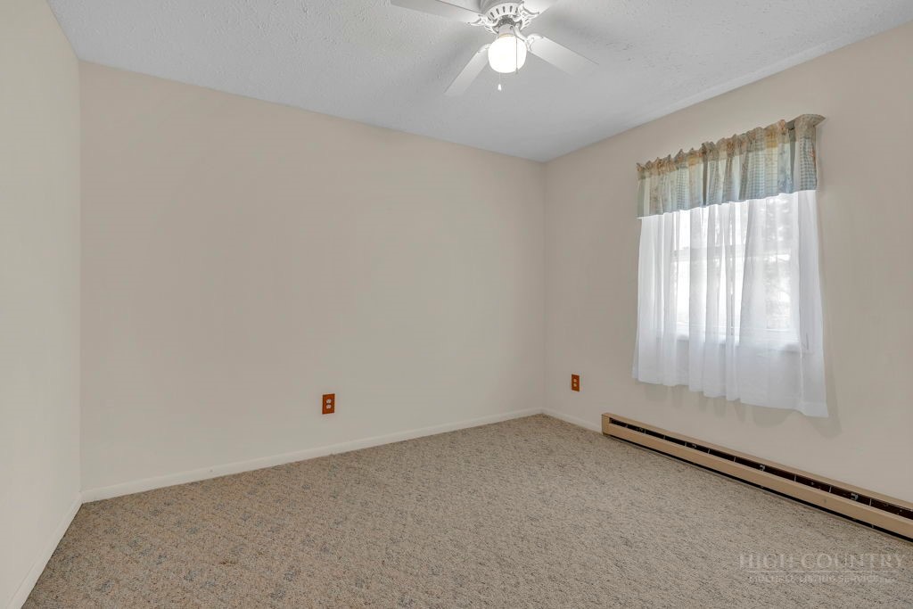 163 Rolling Hill Drive Boone, NC 28607 - Photo 17 of 40 an empty room with a window