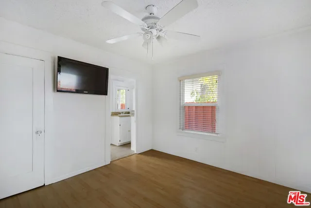 a view of a livingroom with a flat screen tv
