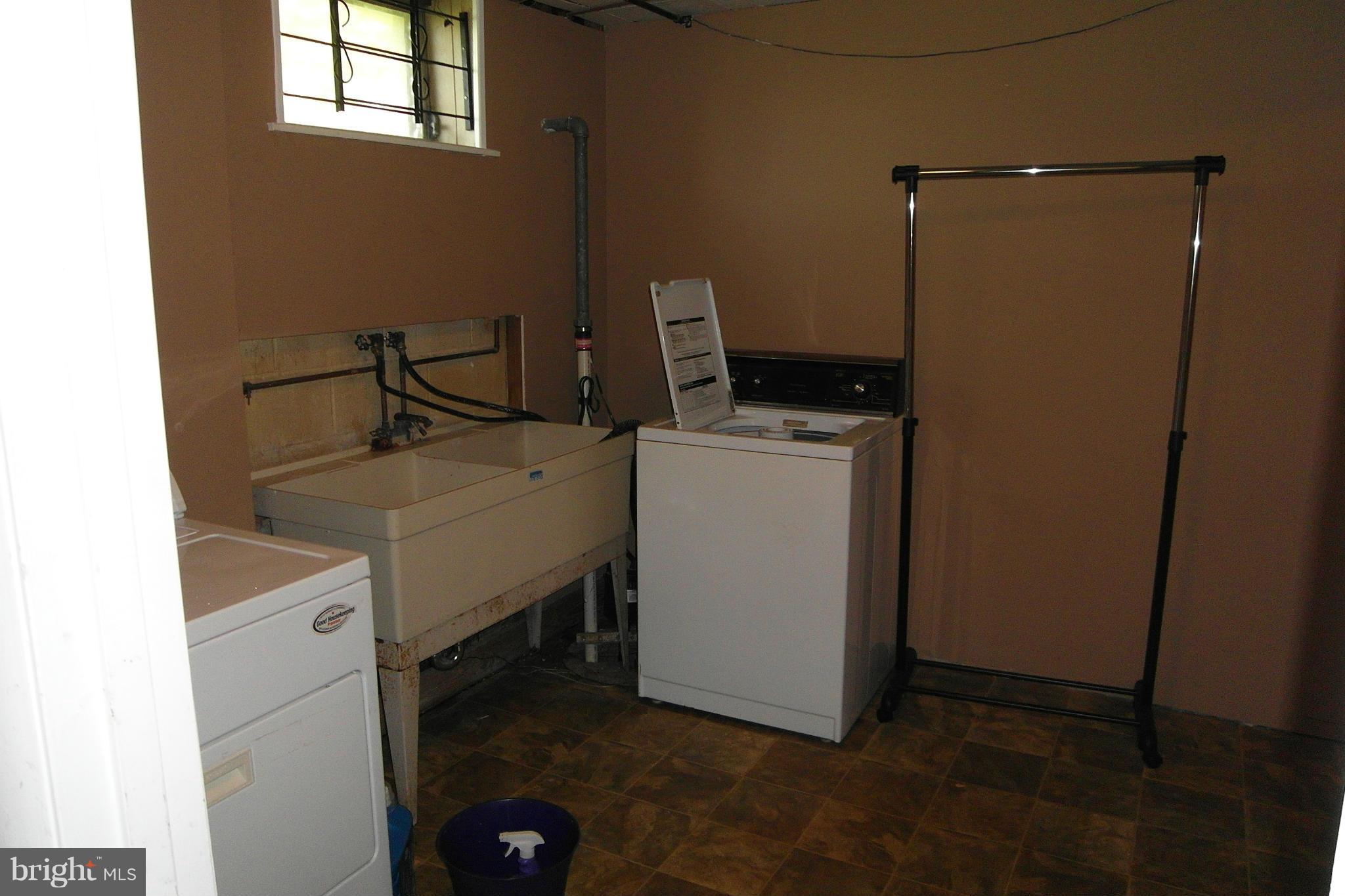 6757 Ransome Drive Baltimore, MD 21207 - Photo 16 of 18 Laundry & Storage Room