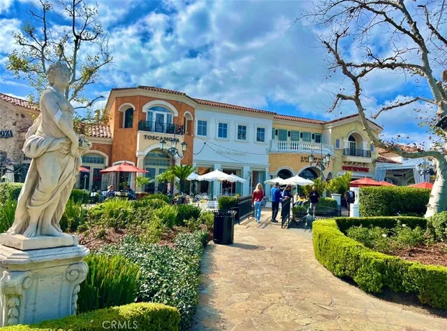 a view of a swimming pool with a yard