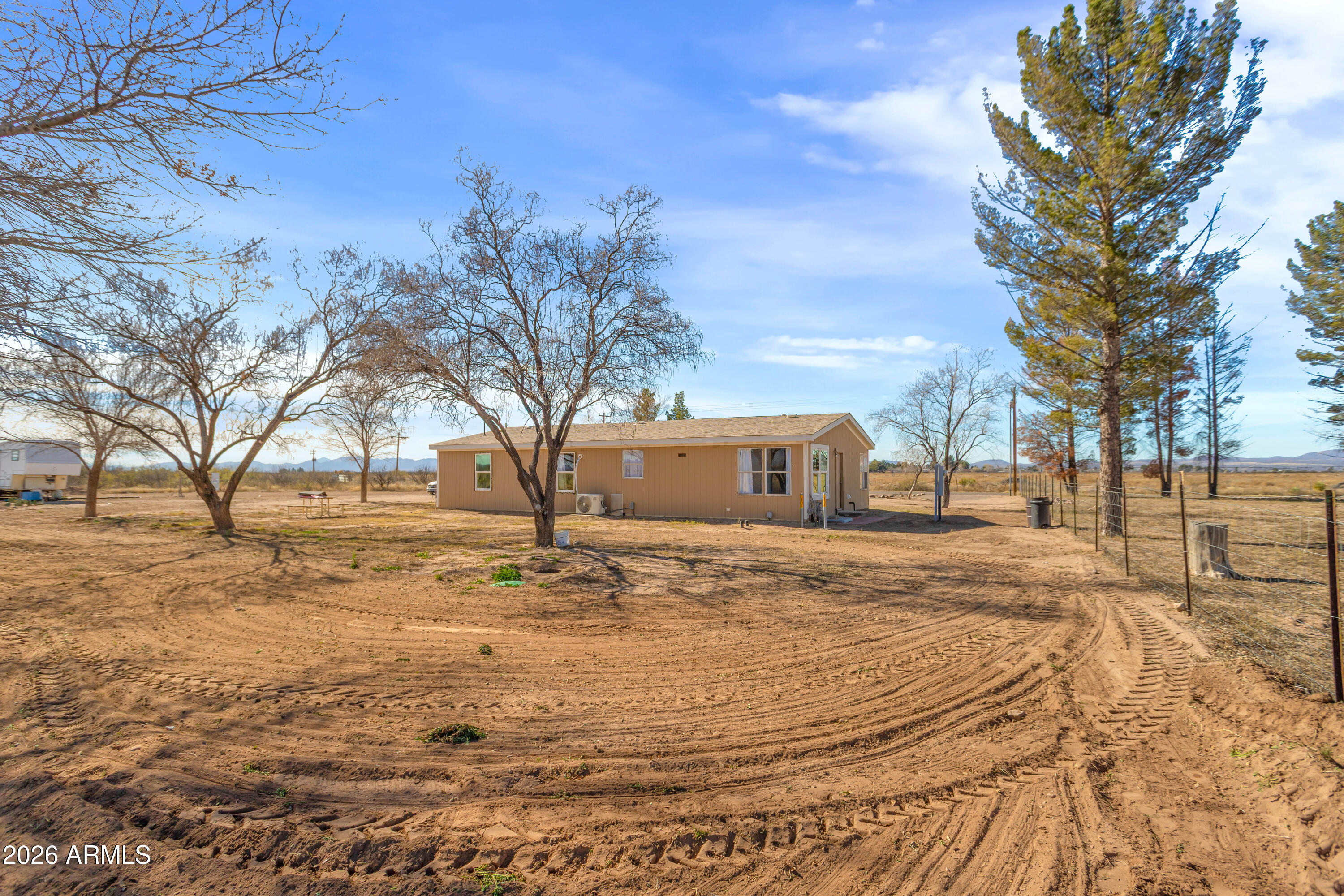 10405 North Mormon Road Elfrida, AZ 85610 - Photo 31 of 43 a big yard with large trees