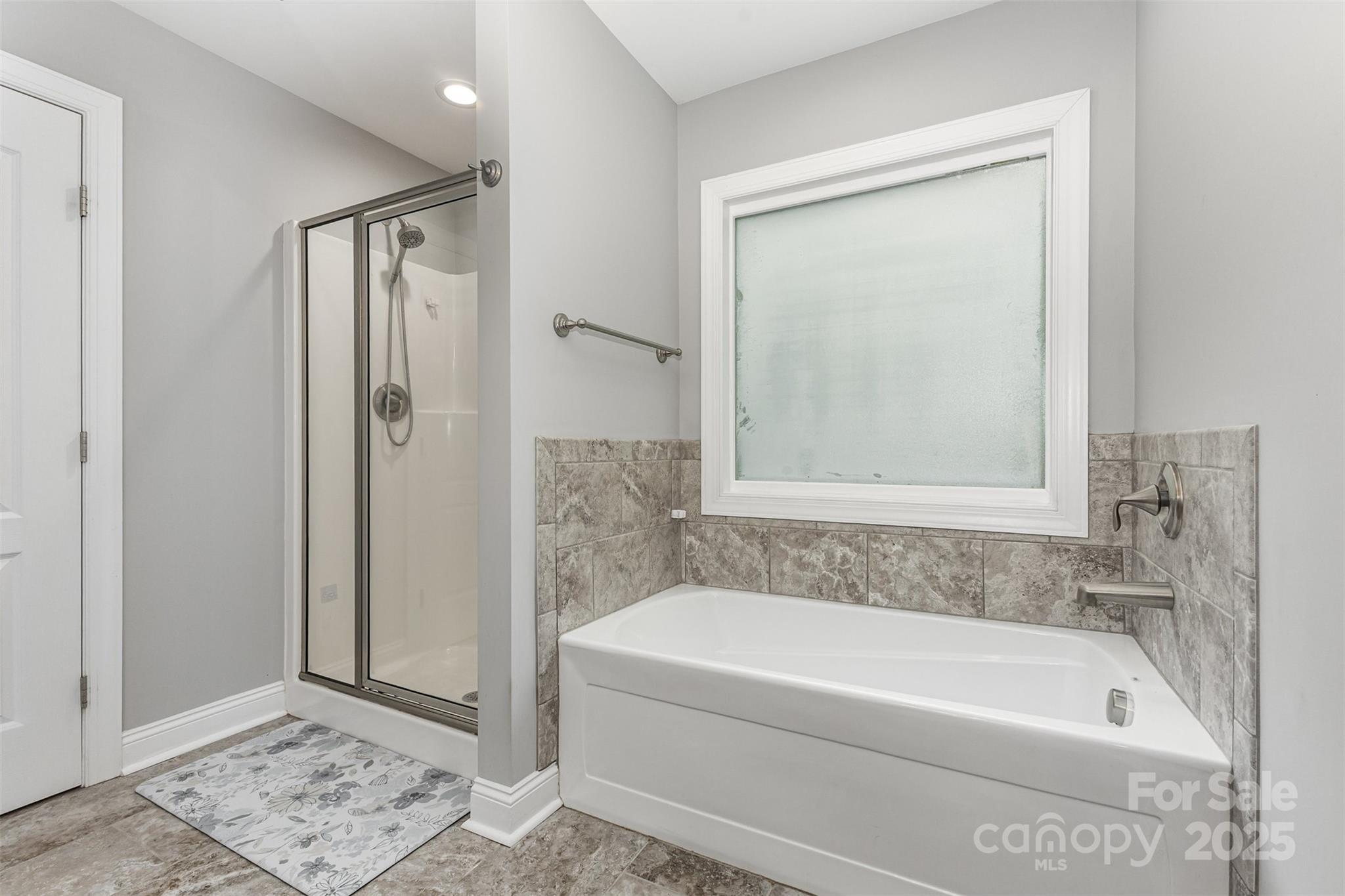1785 Shamrock Avenue Lancaster, SC 29720 - Photo 18 of 30 a bathroom with a bathtub and a shower