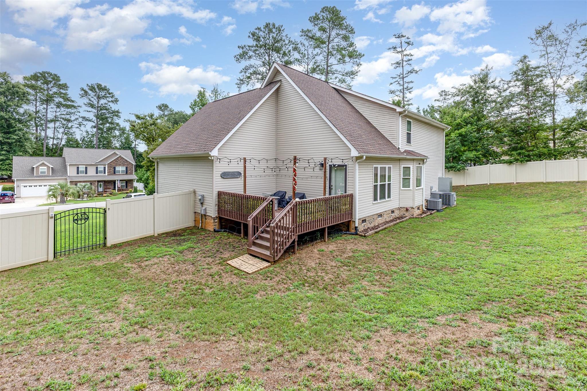 1785 Shamrock Avenue Lancaster, SC 29720 - Photo 28 of 30 a view of a house with a yard and sitting area