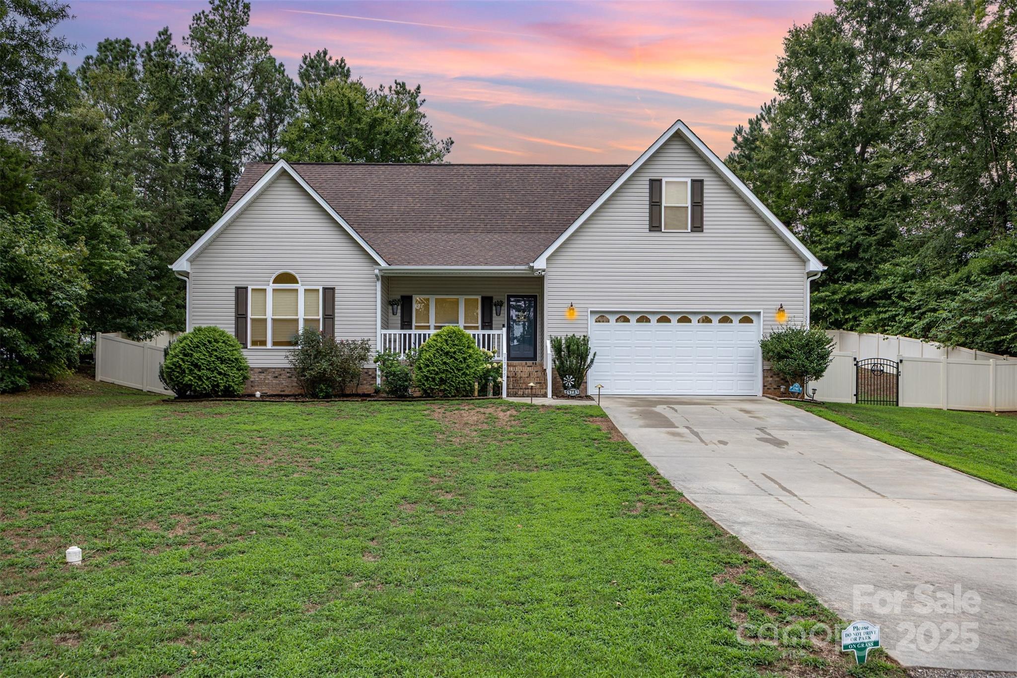 1785 Shamrock Avenue Lancaster, SC 29720 - Photo 30 of 30 a view of a house with a yard and potted plants