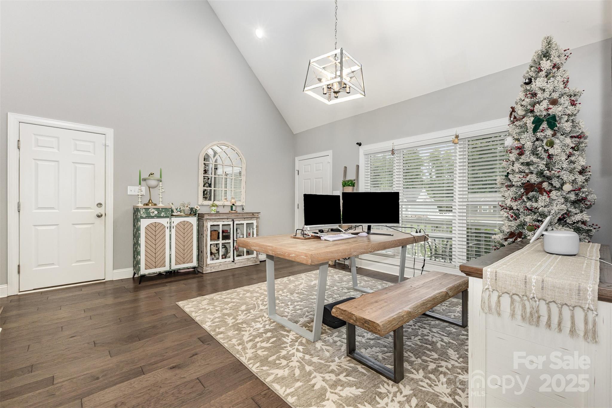 1785 Shamrock Avenue Lancaster, SC 29720 - Photo 5 of 30 a living room with furniture a flat screen tv and a table