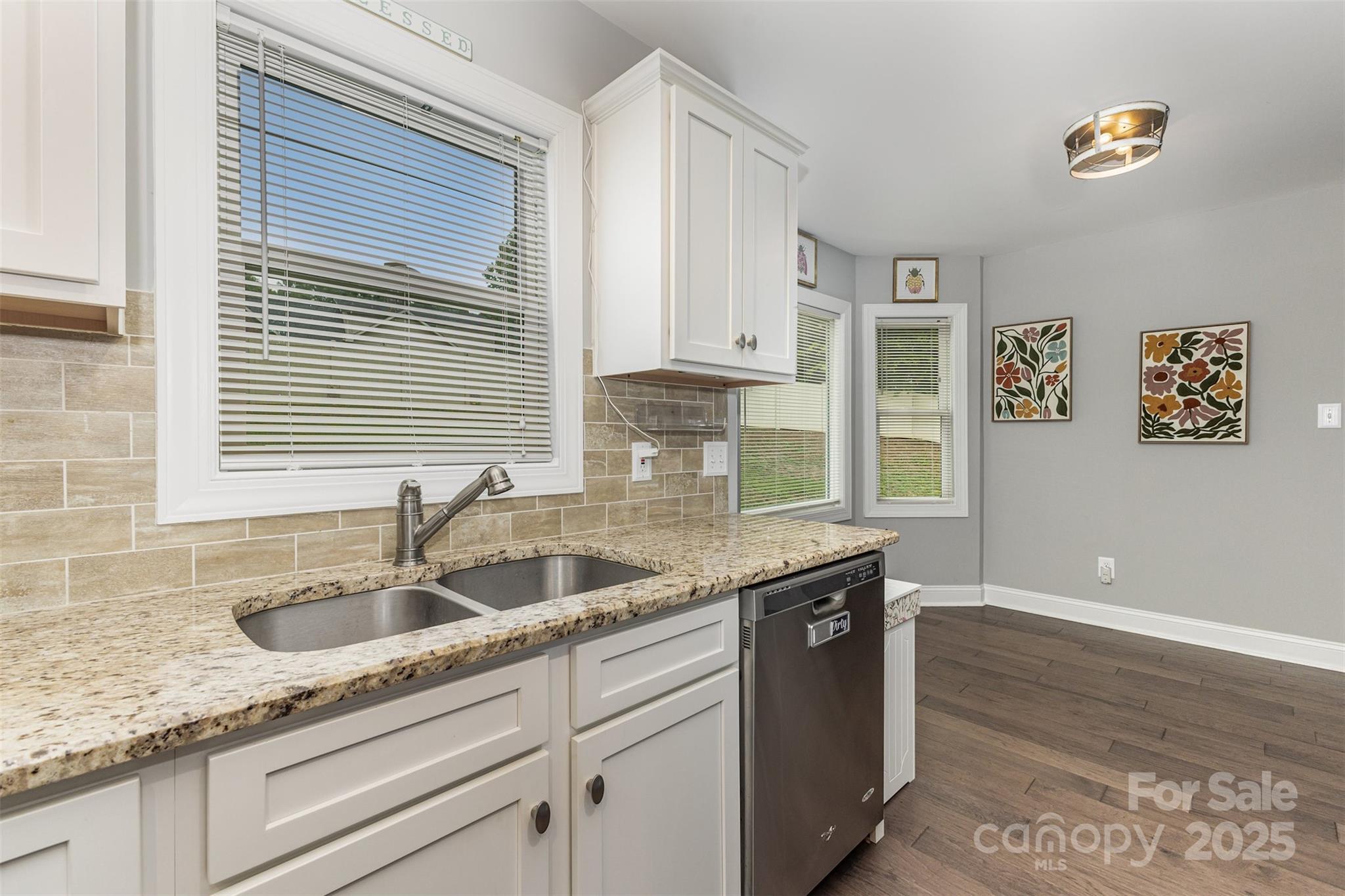 1785 Shamrock Avenue Lancaster, SC 29720 - Photo 8 of 30 a kitchen with granite countertop a sink and a window
