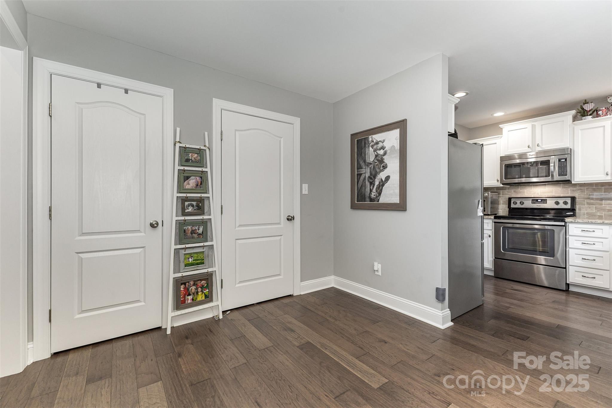 1785 Shamrock Avenue Lancaster, SC 29720 - Photo 10 of 30 a kitchen with granite countertop a refrigerator and a stove top oven