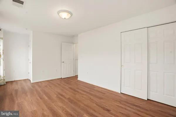 a bathroom with a bathtub and a sink