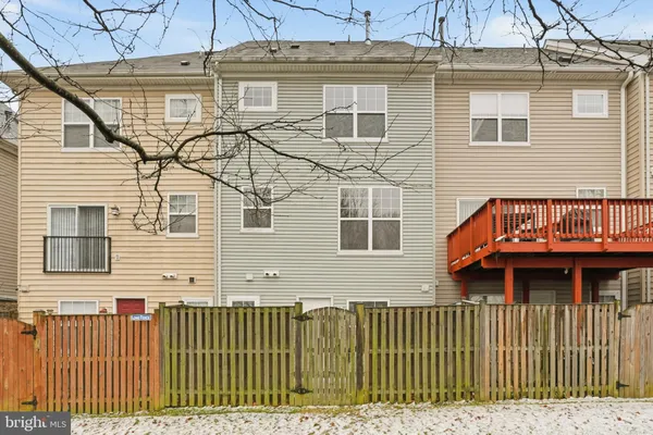 a view of yard with swimming pool and trees