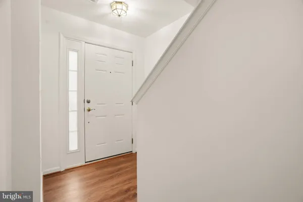 a view of an entryway with hallway