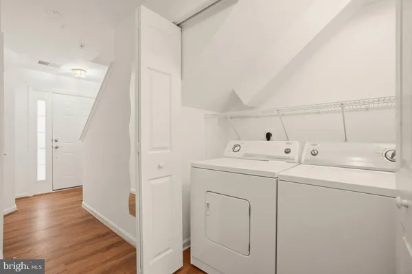 a utility room with dryer and washer