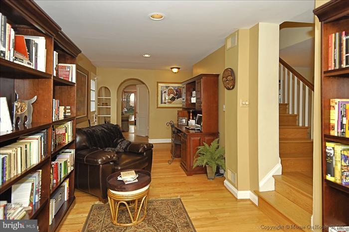 119 Indian Spring Drive Silver Spring, MD 20901 - Photo 4 of 11 a living room with furniture and a floor to ceiling window
