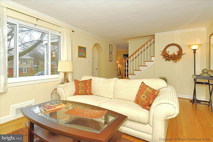 119 Indian Spring Drive Silver Spring, MD 20901 - Photo 9 of 11 a living room with furniture and a window