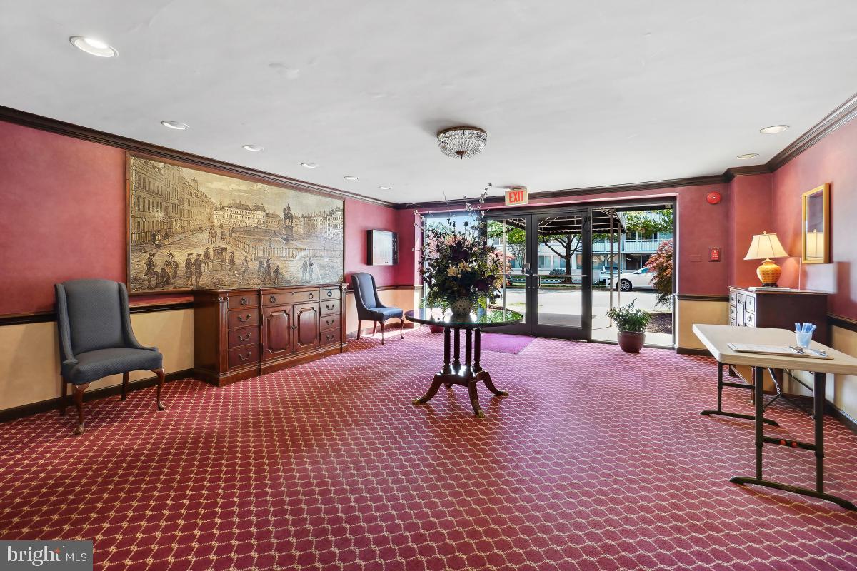 1200 South Arlington Ridge Road, Unit 618 Arlington, VA 22202 - Photo 13 of 17 a living room with furniture a large window and wooden floor