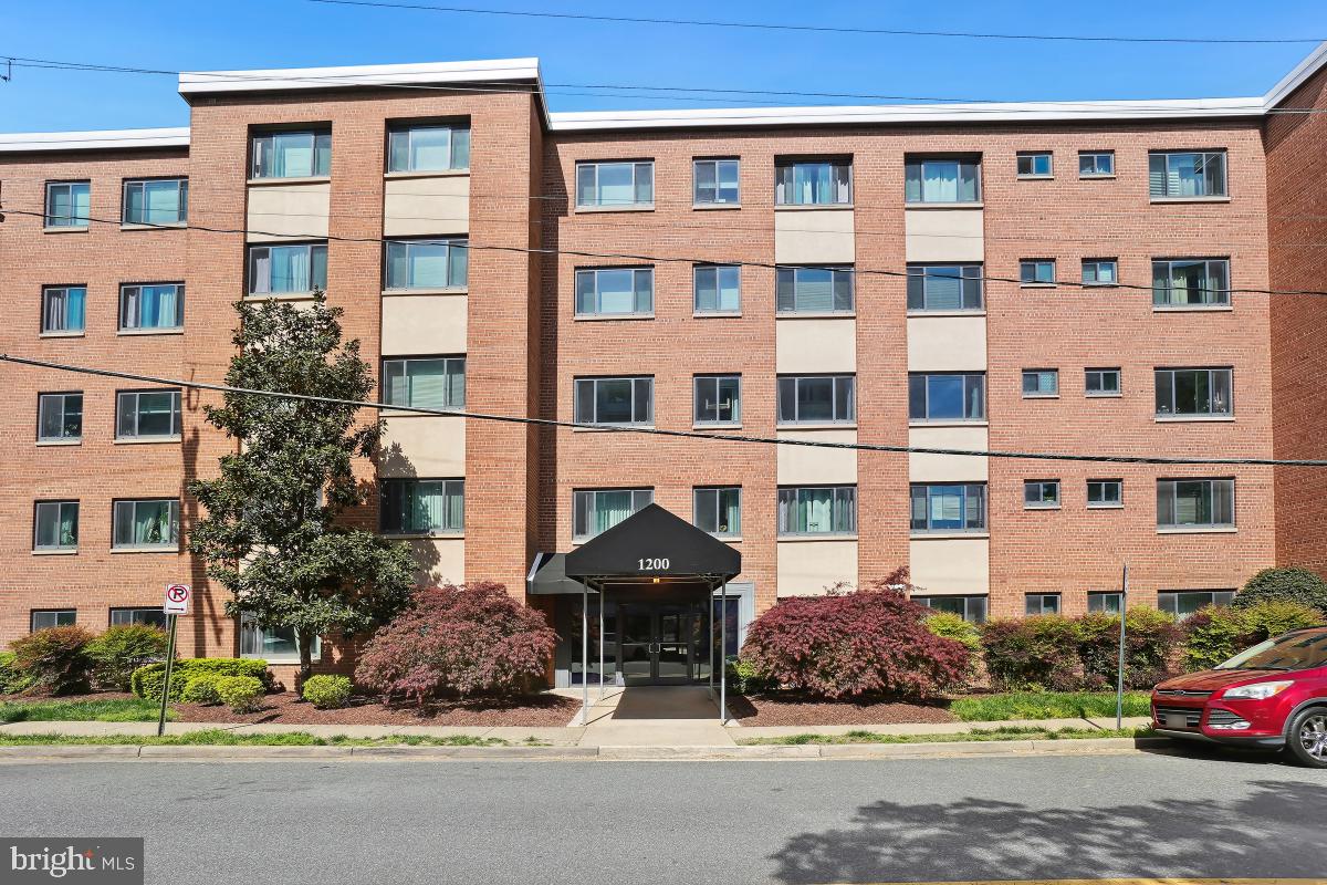 1200 South Arlington Ridge Road, Unit 618 Arlington, VA 22202 - Photo 14 of 17 a front view of a building with parking space