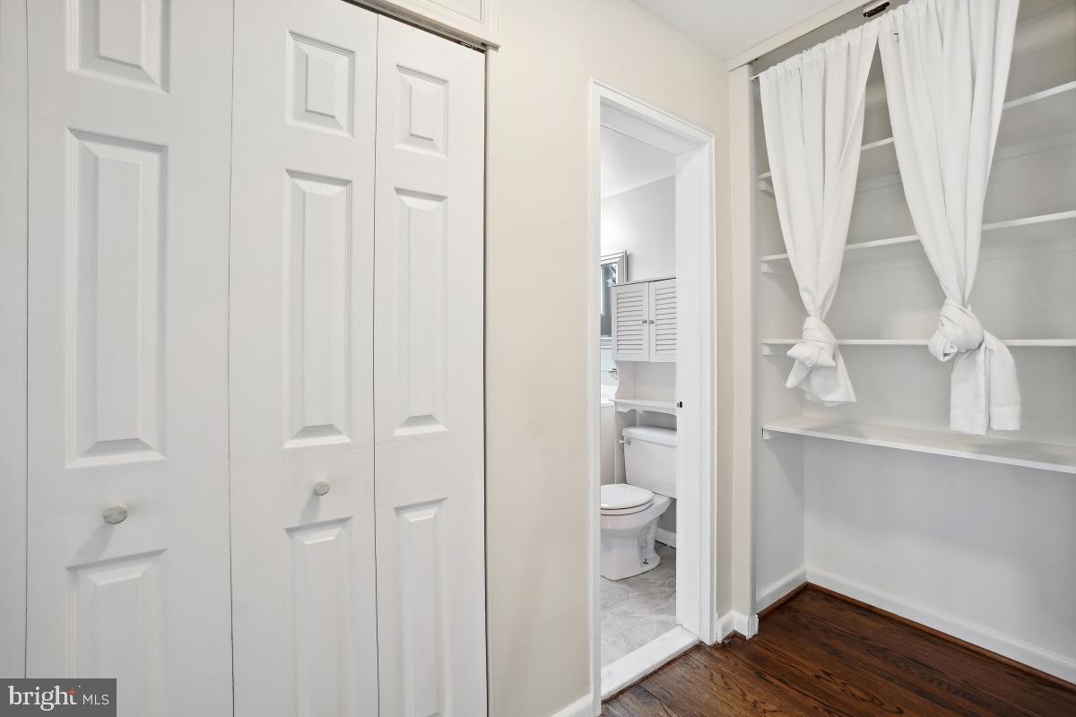 1200 South Arlington Ridge Road, Unit 618 Arlington, VA 22202 - Photo 8 of 17 a bathroom view of a toilet and a shower