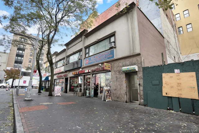 a view of a building with a street