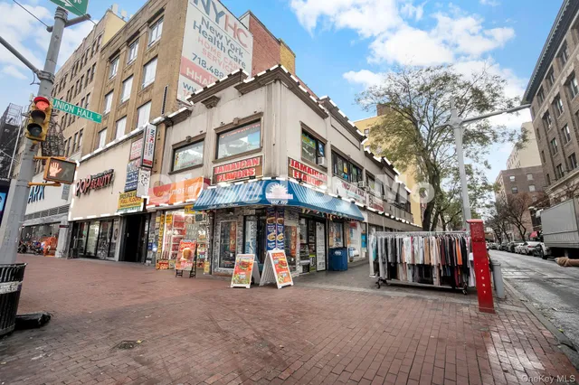 a view of a street with cars