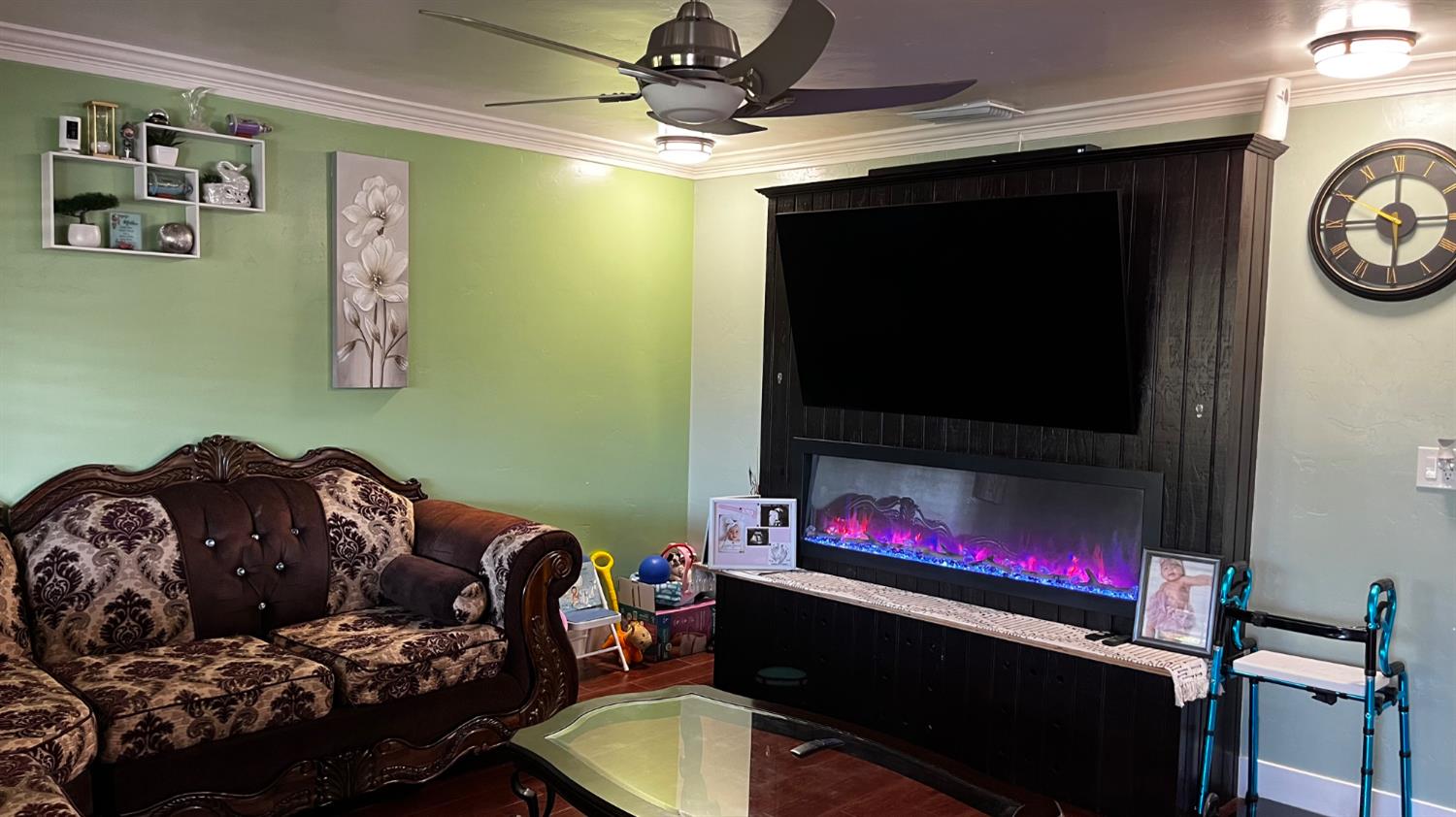 1738 U Street Rio Linda, CA 95673 - Photo 16 of 50 a living room with furniture and a flat screen tv