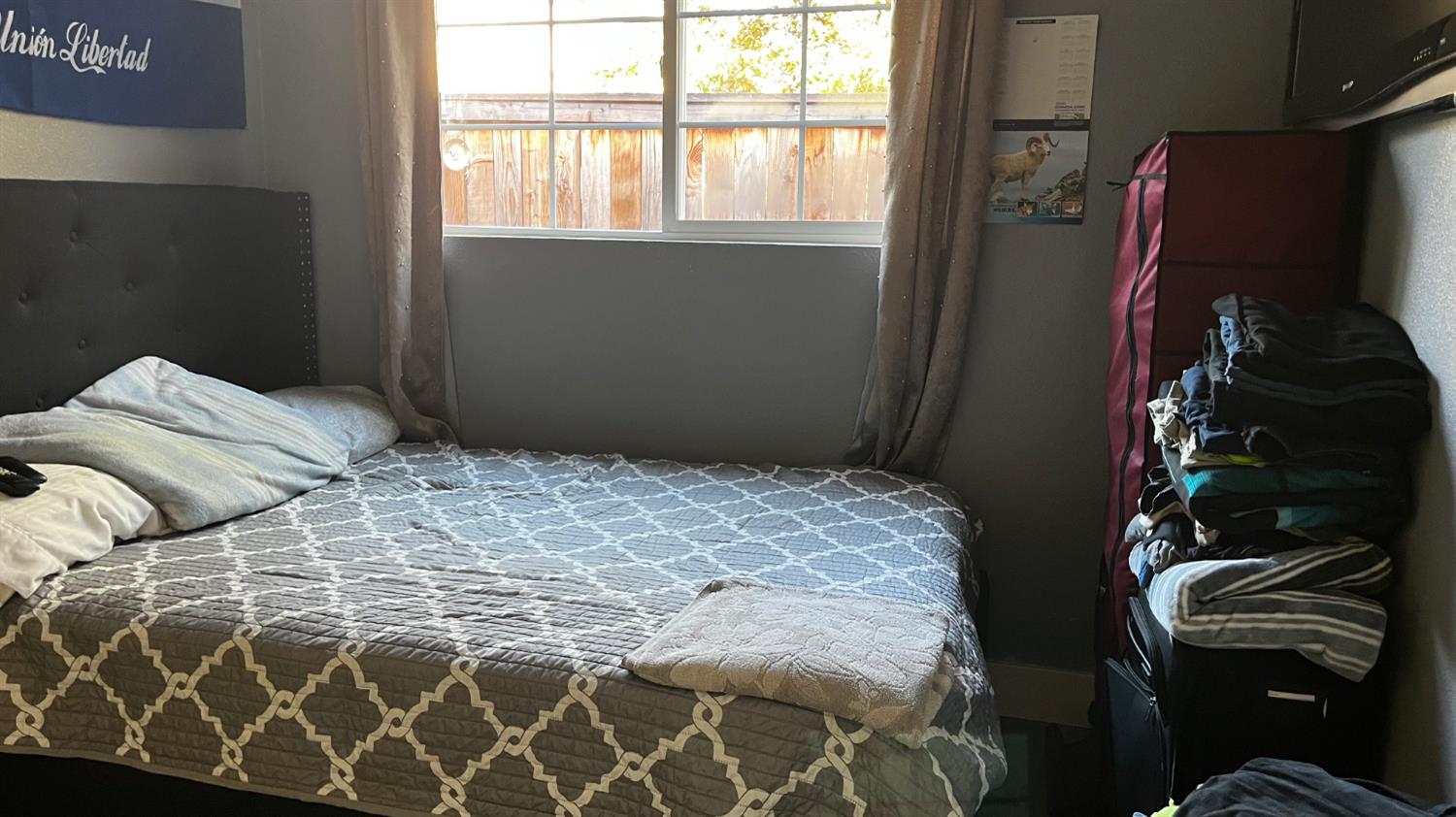 1738 U Street Rio Linda, CA 95673 - Photo 18 of 50 a bedroom with a bed and a window