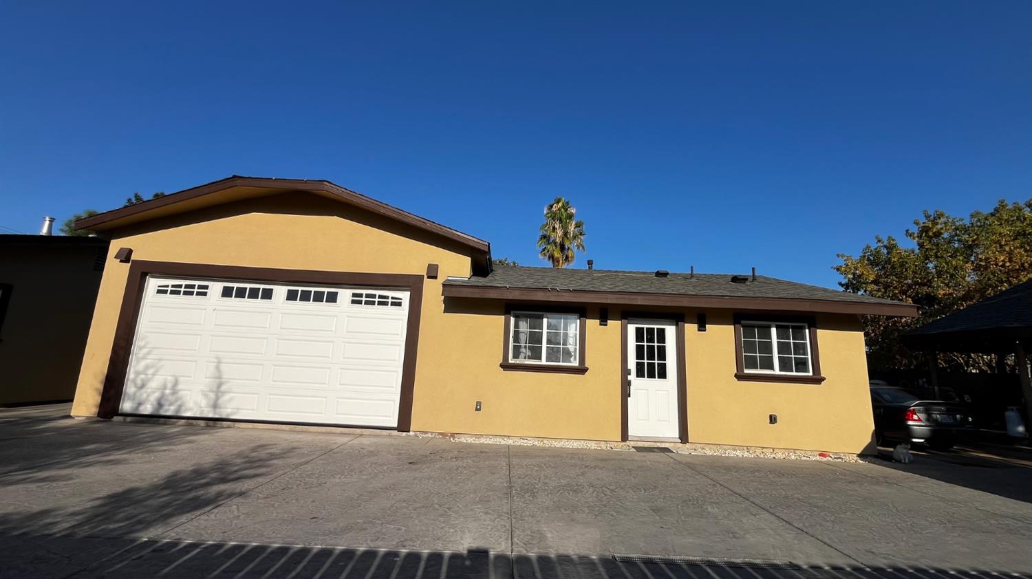 1738 U Street Rio Linda, CA 95673 - Photo 30 of 50 a front view of a house with a garage