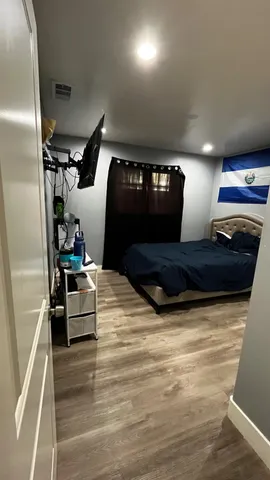 a bathroom with a sink a toilet and a shower