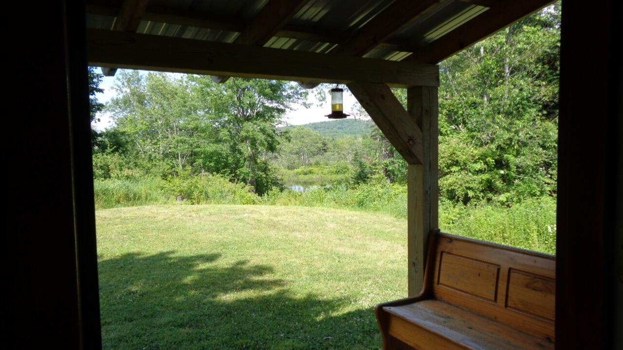 242 Curtis Road Monroe, ME 04951 - Photo 6 of 28 covered porch