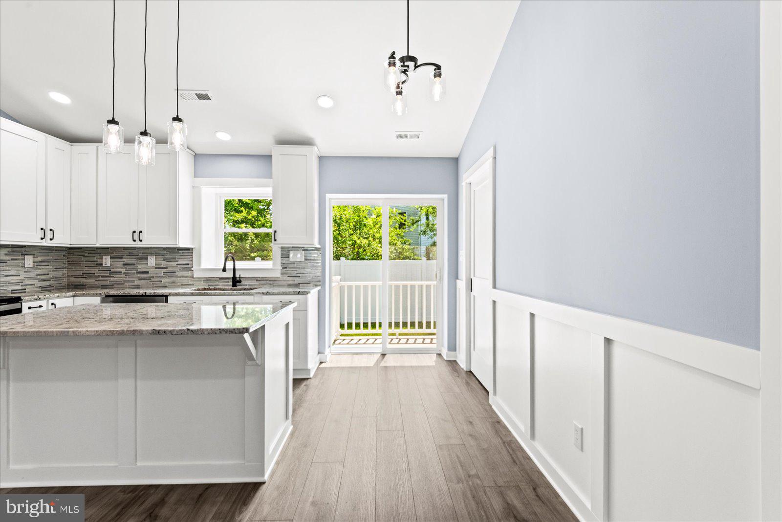 408 Wirt Street Colonial Beach, VA 22443 - Photo 11 of 46 Bright and airy kitchen with charm.