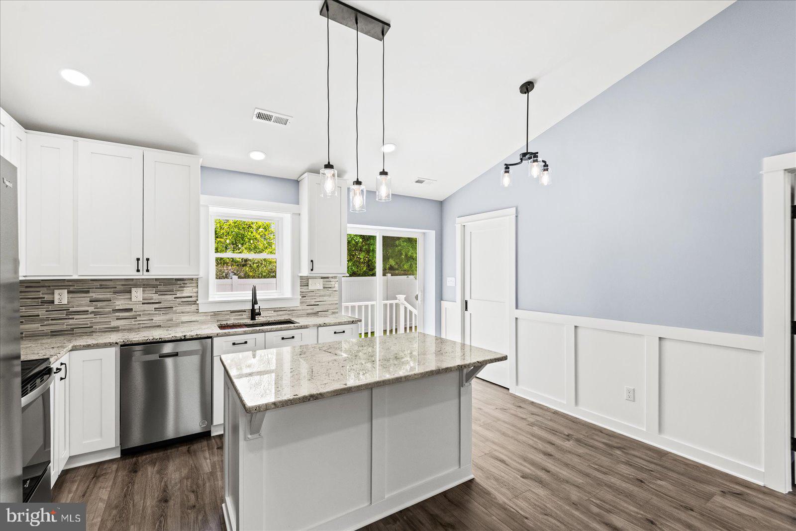 408 Wirt Street Colonial Beach, VA 22443 - Photo 13 of 46 Modern kitchen with elegant finishes.