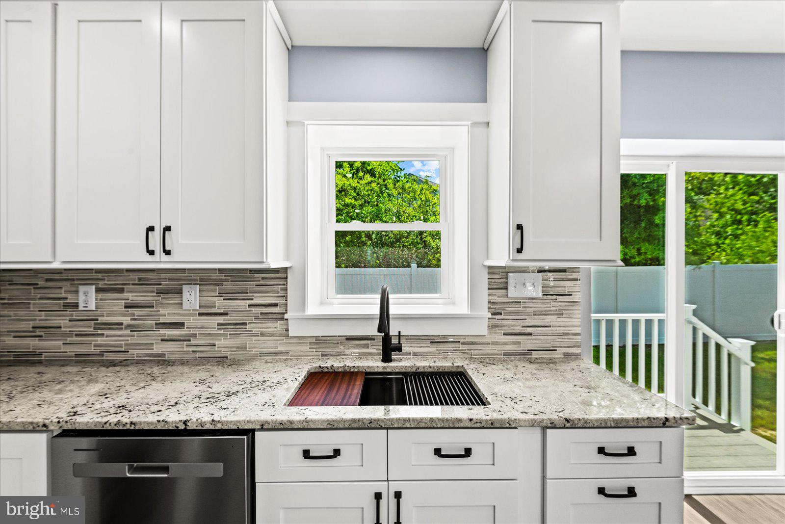 408 Wirt Street Colonial Beach, VA 22443 - Photo 16 of 46 Bright kitchen with modern finishes.