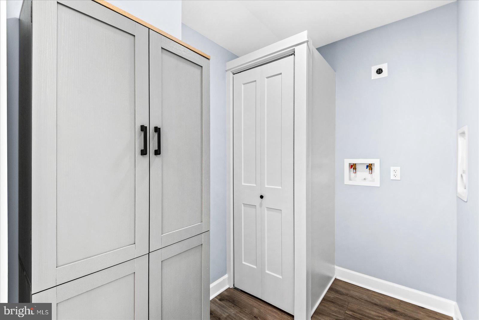 408 Wirt Street Colonial Beach, VA 22443 - Photo 17 of 46 Modern storage solutions in soft hues.
