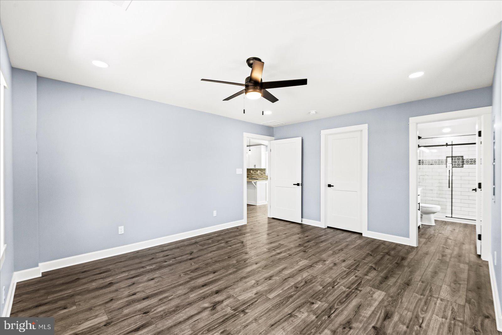 408 Wirt Street Colonial Beach, VA 22443 - Photo 20 of 46 Spacious room with modern charm.