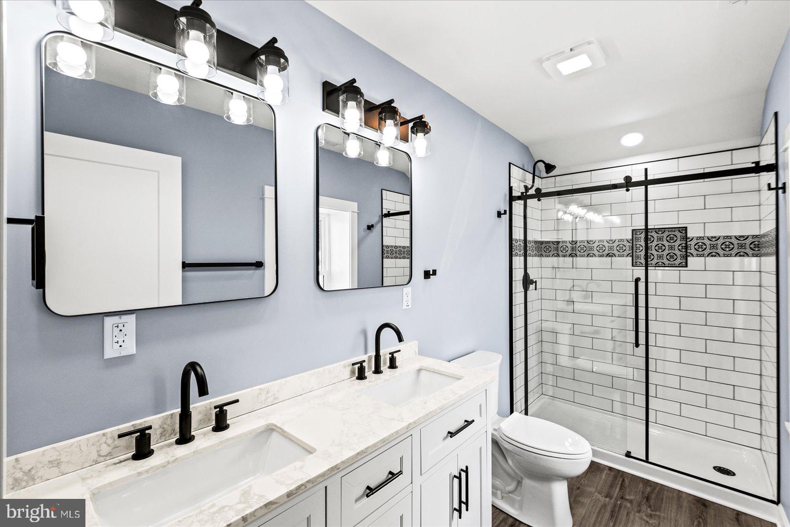 408 Wirt Street Colonial Beach, VA 22443 - Photo 24 of 46 Sleek modern bathroom with stylish fixtures.