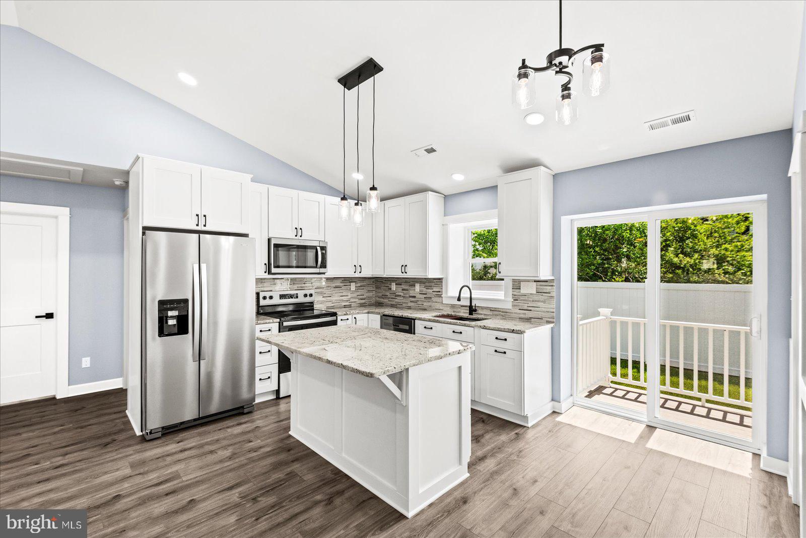 408 Wirt Street Colonial Beach, VA 22443 - Photo 10 of 46 Modern kitchen with natural light.