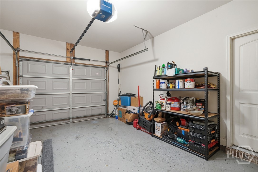 11330 White Bluff Road, Unit 31 Savannah, GA 31419 - Photo 32 of 36 One-car garage is large and features a floor finish.