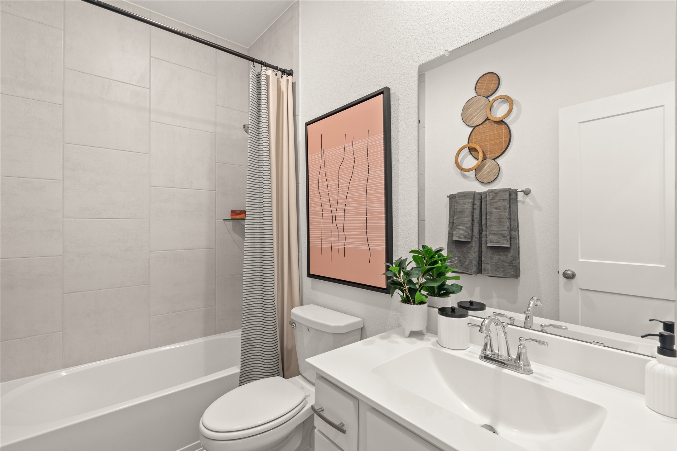 5243 Palo Verde Drive Manvel, TX 77578 - Photo 25 of 29 a bathroom with a sink vanity mirror bathtub and toilet