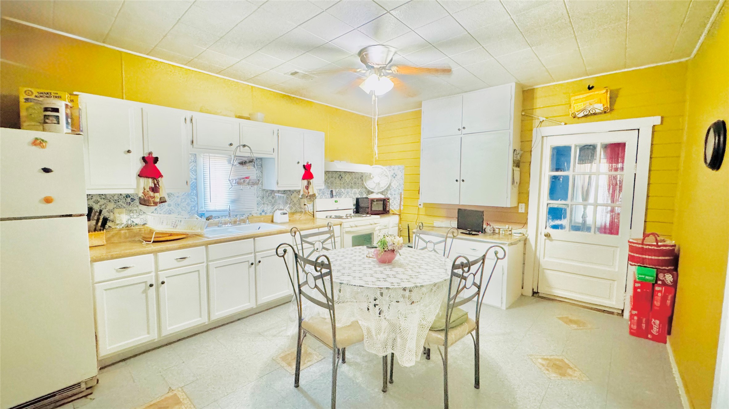 1604 Pine Street Georgetown, TX 78626 - Photo 11 of 13 a view of a dining room with furniture and a chandelier