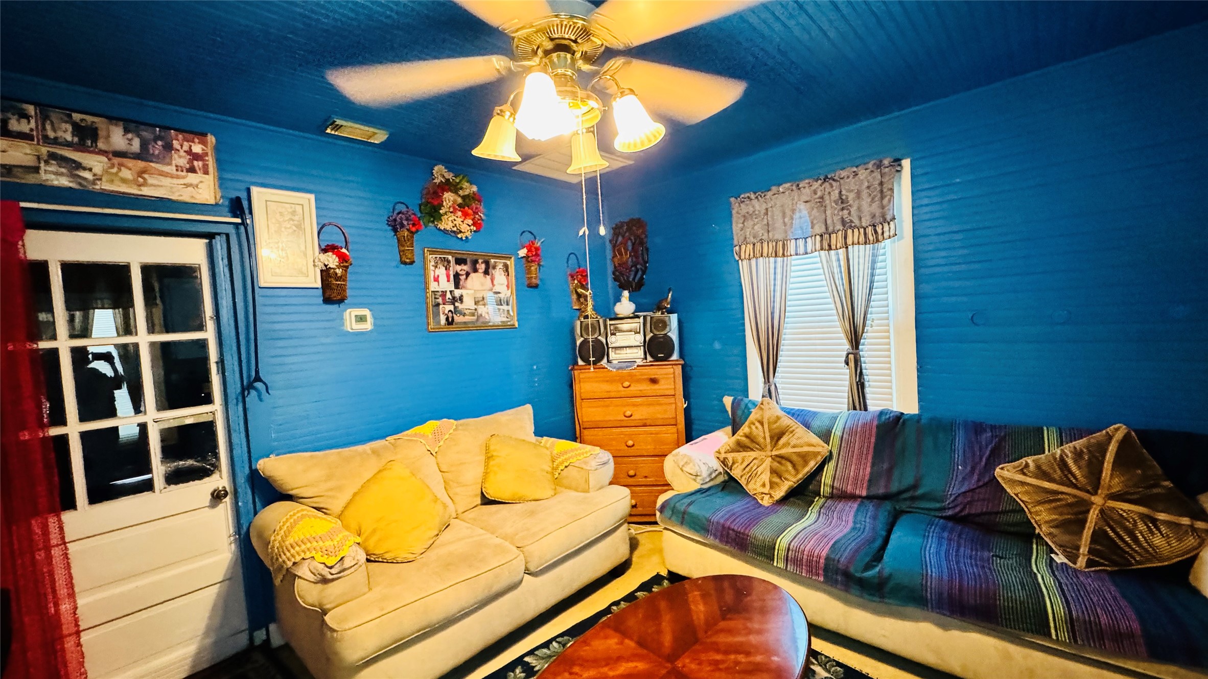 1604 Pine Street Georgetown, TX 78626 - Photo 3 of 13 a view of a dining room with furniture and a chandelier